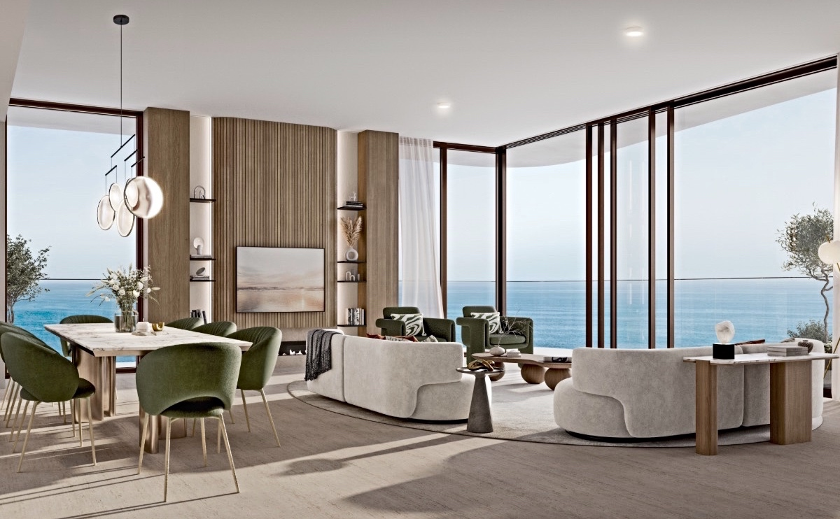 Living and dining room of a 3 bedroom corner apartment in The Mural with sea views